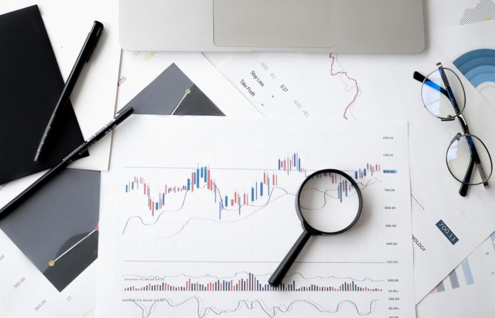 Workspace with charts and statistical analysis materials